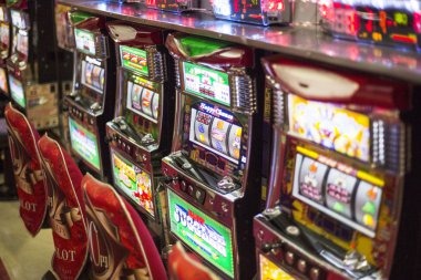 Lucky Twins slot game showing five reels with matching symbols and multiplier display